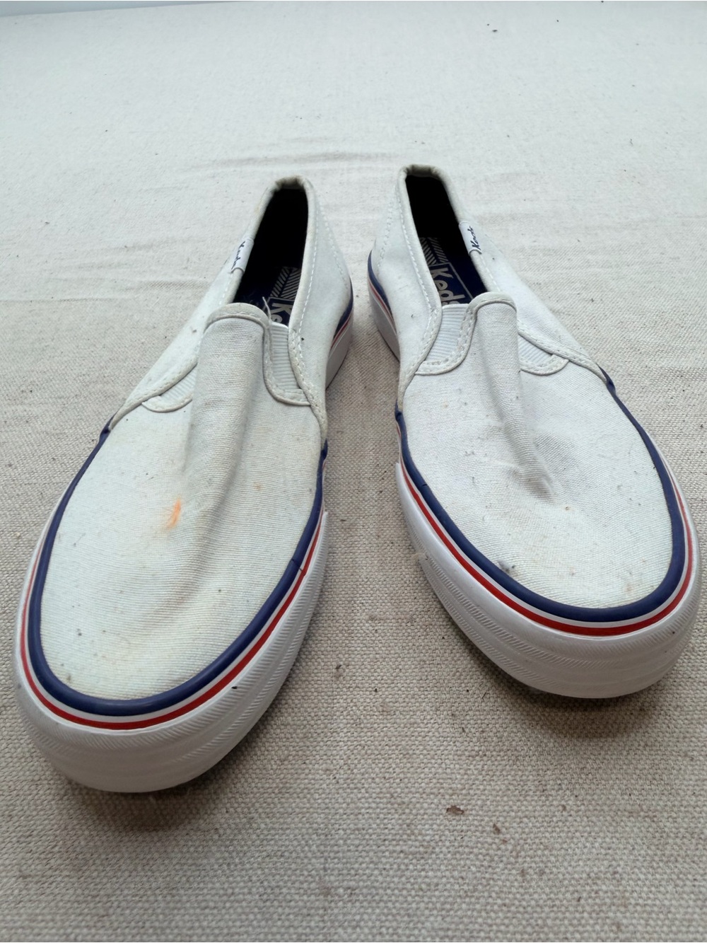 Keds White Canvas Slip-On Loafers with Red & Blue Trim